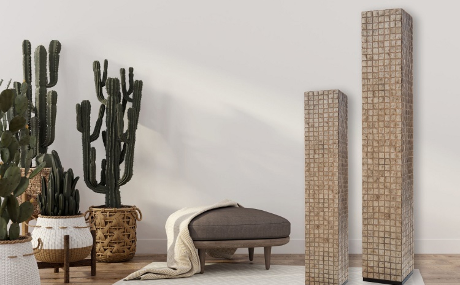Boho-style interior with leather pouf and cacti